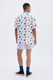 Beige Shirt with 'La Plage' print, a stylish collaboration by Matías Larrain.