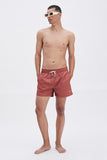Terracotta Swim Shorts with 'Leone' print, a stylish collaboration by Uberta Zambeletti.