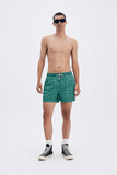 Green Swim Shorts with 'Leone' print, a stylish collaboration by Uberta Zambeletti.