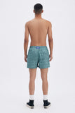 Green Swim Shorts with 'Leone' print, a stylish collaboration by Uberta Zambeletti.