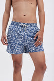 Blue Swim Shorts with 'Le Bel Été' print, a stylish collaboration by Edith Carron.