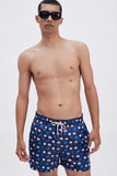 Blue Swim Shorts with 'La Plage' print, a stylish collaboration by Matías Larrain.