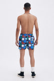 Blue Swim Shorts with 'Hellas' print, a stylish collaboration by Julie Safirstein.