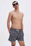 Black Swim Shorts with 'Mexican Birds' print, a stylish collaboration by Marion Deuchars.