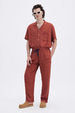 Terracotta Iconic Pants with 'Leone' print, a stylish collaboration by Uberta Zambeletti.