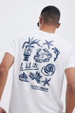 White Tee with 'Le Bel Été' print, a stylish collaboration by Edith Carron