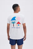 Beige Tee with "La Plage" print, a stylish collaboration by Matías Larrain