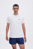 Beige Tee with "La Plage" print, a stylish collaboration by Matías Larrain